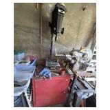 Drill press with cabinet. Working order unknown.