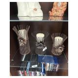 3 candle holders with candles