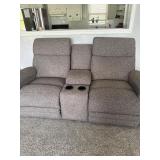 Sofa with recliners on each side and cup