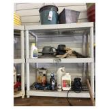 Plastic shelving unit with contents