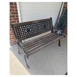 Cast iron legged outdoor bench