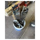 Bucket of saws