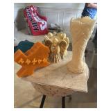 Various wax candles, 2 cups and various trinkets.