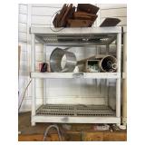 Plastic shelving unit with contents