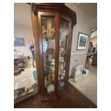 Curio cabinet that is @6.5 feet high. Has 4 glass