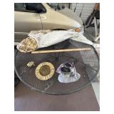 4 ft diameter Iron table and items on it.