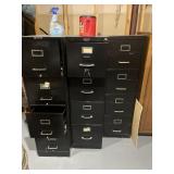 3 empty file cabinets