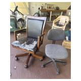 Two rolling office chairs