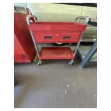 Metal rolling cart with 1 storage drawer.