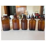 Antique Amber glass bottles with lids