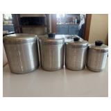 Vintage aluminum four piece canister set