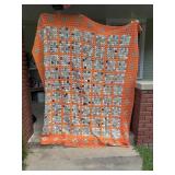 Antique handmade yo-yo quilt