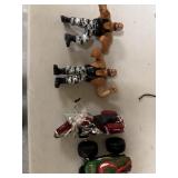 Action figures and miniature motorcycle and truck