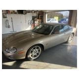 2001 Jaguar XK8, 2 door, 8 cyl., gas, gold