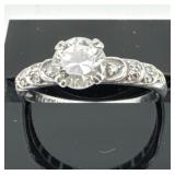 Platinum Diamond Ring with Center and Accent Stone