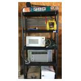 Plastic Shelf with Contents & Smith Corona Typewri