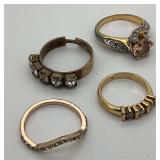 4 Gold Tone Rings with Clear Stones