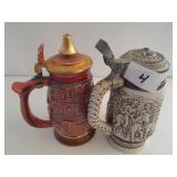 2 Avon Drink Steins