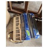 Blue and White Accordion with Keys and Buttons