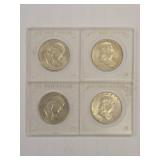 Four U.S. Franklin Half Dollars in Plastic Holders