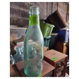 Glass Bottle Embossed With L.C. Stuckey Rockstream