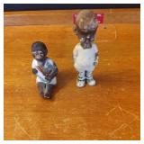 Two Ceramic Figurines with Painted Details