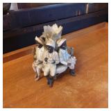 Figurative Decorative Piece Featuring Seated Figur