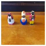 Three Ceramic Figurines Representing Individuals