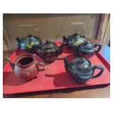 Six Decorative Teapots With Handles and Painted De