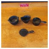 Four Miniature Cast Iron Cookware Pieces