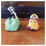 Two Hand-Painted Ceramic Figurines of Women in Dre