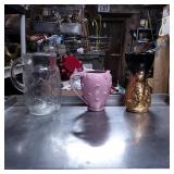 Three Decorative Pitchers in Various Styles
