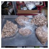 Five Bags of Wooden Pegs in Various Sizes