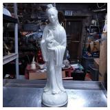 Porcelain Figurine of Woman in Traditional Dress
