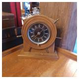 Wooden Shipï¿½s Wheel Clock with Brass Accents