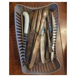 Butter Knives and Utensils in a Plastic Tray