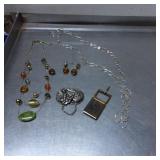 Two Necklaces, Brooch, Belt Buckle, and Earrings