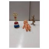 Figurine Lot Featuring Peeing Man, Rabbit, and Dol
