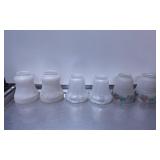 Seven Frosted Glass Lamp Shades with Various Desig