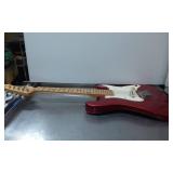 Red Electric Guitar with Maple Neck and White Pick