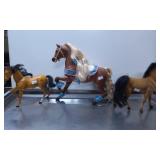 Three Plastic Horse Figures with Accessories