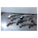 9 Vintage Toy Cap Guns with Varied Designs