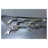 Five Vintage Toy Cap Guns with Assorted Designs