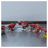 6 Plastic Lip-Shaped Figurines With Cartoon Featur