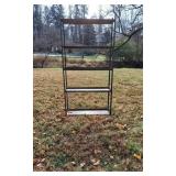 Metal Shelving Unit with Signs of Age and Wear