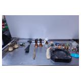 Decorative Items Including Knives, Figurines, and