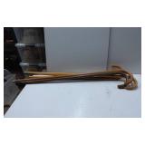 Four Wooden Canes with Curved Handles