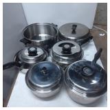 Six Stainless Steel Pots and Pans with Lids