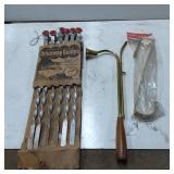 Driveway Guides, Brass Horn, and Unopened Strap