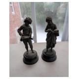 Cast Metal Sculptures of a Male and Female Figure